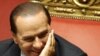 Берлускони остается у власти
