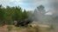 Фото: українські військові проводять постріли з гаубиць M777, червень 2022 року