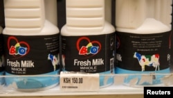 FILE - Milk containers are seen in the dairy section of a supermarket in Nairobi, Kenya, May 8, 2017. 