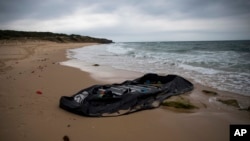 FILE - In this Thursday, June 28, 2018 file photo, a rubber dinghy used by Moroccan migrants is seen near Tarifa, in the south of Spain. 