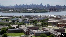 More than three dozens of people have tested positive for coronavirus in New York City jails, including at the notorious Rikers Island jail complex, the board that oversees the city's jail system says, March 21, 2020.
