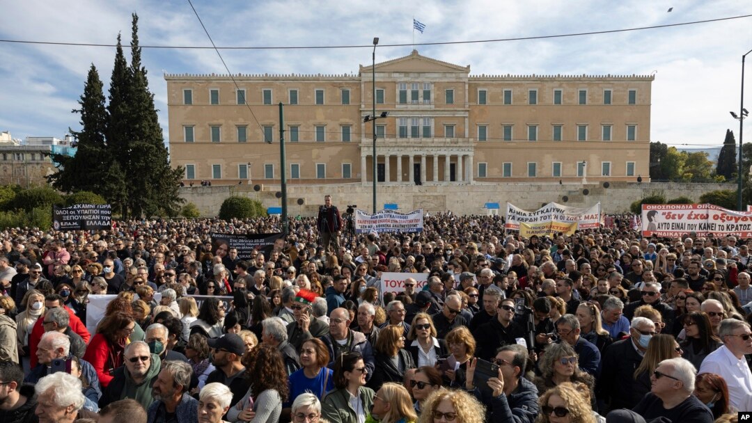 People attend a rally organised by the association of the families of victims of the Tempe, Greece, train collision, which killed 57 people almost two years ago, at central Syntagma square, in Athens, Jan. 26, 2025. 