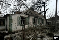 This photo taken and released by the National Police of Ukraine on Dec. 19, 2024, shows a house damaged as a result of a missile attack in Shevchenkove, Kharkiv region.