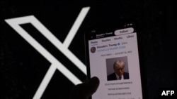 FILE - This illustration photo shows former U.S. President Donald Trump's mugshot on X (formerly Twitter), on August 24, 2023.