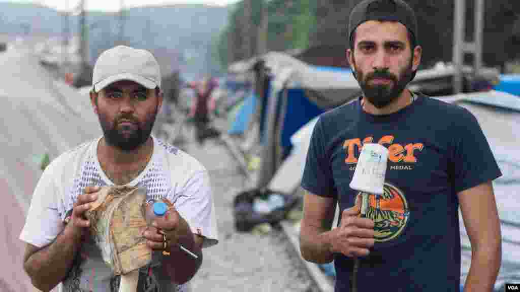 Some members of the Refugees.tv crew – Abou Mohammad, front, Bassil Yatakan, back left, Machmoud Abdulrahim, back right (J. Owens/VOA).