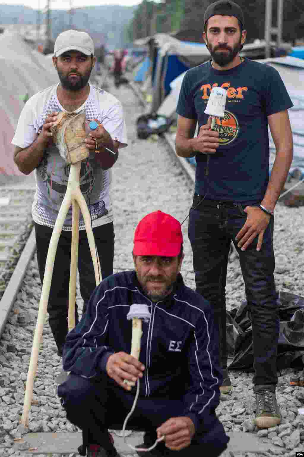 Some members of the Refugees.tv crew – Abou Mohammad, front, Bassil Yatakan, back left, Machmoud Abdulrahim, back right (J. Owens/VOA).