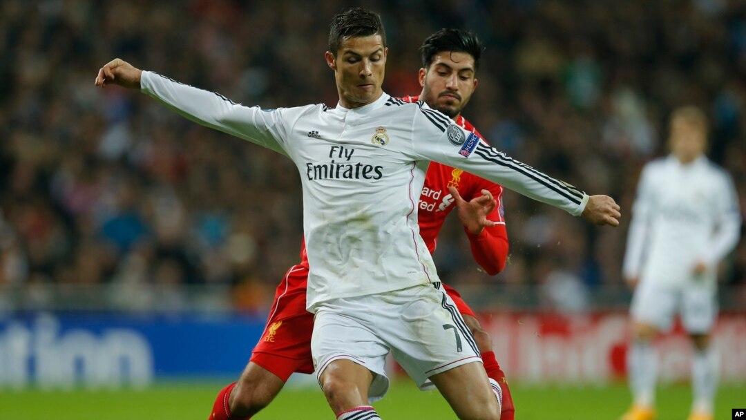 Pemain Real Madrid, Cristiano Ronaldo, dalam sebuah pertandingan melawan Liverpool, November 2014. (AP/Paul White)