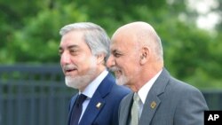 FILE - Afghanistan's President Ashraf Ghani, right, and Chief Executive Abdullah Abdullah.