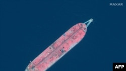 FILE - This handout satellite image obtained courtesy of Maxar Technologies on July 19, 2020, shows a view of the FSO Safer oil tanker, off the Ras Isa marine terminal, Yemen.
