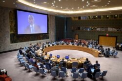 FILE - Nickolay Mladenov, on screen, Special Coordinator for the Middle East Peace Process, addresses the U.N. Security Council as it considers the situation in the Middle East, in this May 22, 2019, image obtained from the U.N.