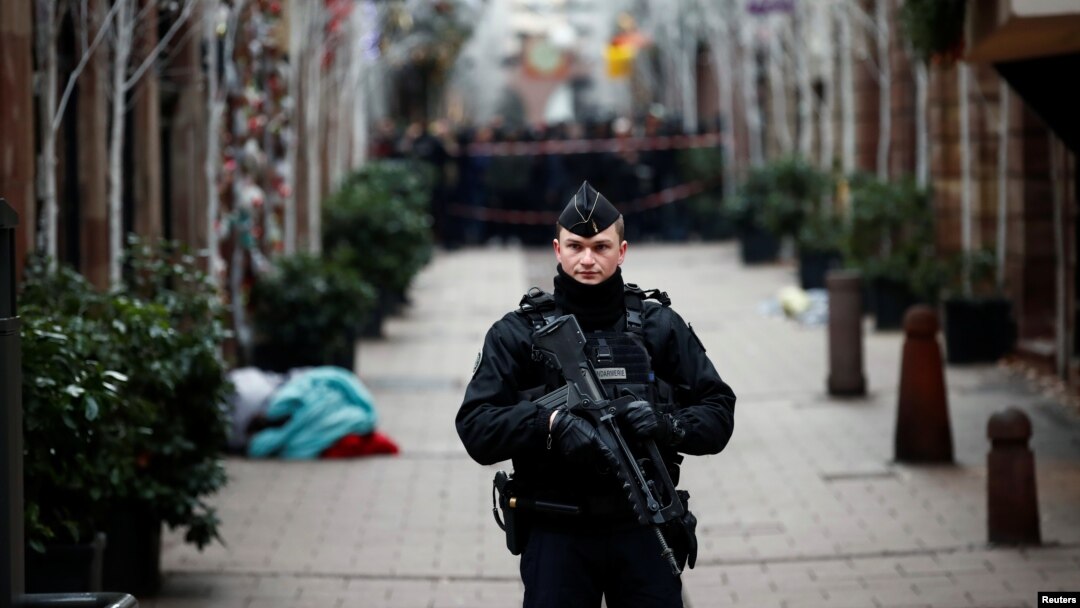 A French gendarme secures a street at the scene of a police operation the day after a shooting in Strasbourg, Dec. 12, 2018. 