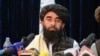 Taliban spokesperson Zabihullah Mujahid looks on as he addresses the first press conference in Kabul on Aug. 17, 2021 following the Taliban stunning takeover of Afghanistan.