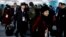Members of the North Korean Olympic delegation arrive at the Olympic Village of the 2018 Winter Olympics in Gangneung, South Korea, Feb. 1, 2018.