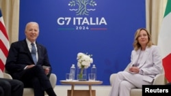 У 2024 році Італія головує у G7. Прем’єр-міністерка Італії Джорджа Мелоні приймає президента США Джо Байдена в рамках саміту G7 на курорті Борго Егнація, Савеллетрі, Апулія, Італія, 14 червня 2024 року. REUTERS