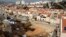 Palestinian men work at a construction site in the West Bank Jewish settlement of Ariel, Jan. 25, 2017.
