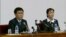 탈북해서 한국에 정착했다가 다시 북한으로 재입북한 김광혁(왼쪽), 고정남 부부. 8일 북한 관영 조선중앙TV가 이들의 기자회견 장면을 보도했다.