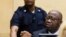Former Ivory Coast President Laurent Gbagbo attends a confirmation of charges hearing in his pre-trial at the International Criminal Court in The Hague, Feb. 19, 2013.