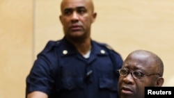 FILE - Former Ivory Coast President Laurent Gbagbo attends a confirmation of charges hearing in his pre-trial at the International Criminal Court in The Hague, Feb. 19, 2013.