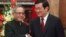 India's President Pranab Mukherjee (L) shakes hands with his Vietnamese counterpart Truong Tan Sang before their meeting at the Presidential Palace in Hanoi, Sept. 15, 2014.