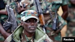 M23 military leader General Sultani Makenga attends a press conference in Bunagana in eastern Democratic Republic of Congo Jan. 3, 2013. 