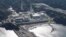FILE - Onagawa Nuclear Power Plant is seen in Onagawa town, Miyagi Prefecture, Sept. 7, 2011, ahead of the six month anniversary this weekend since March 11 earthquake and tsunami. 