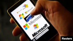 A Nokia Lumia 820 smartphone with Microsoft logos on the screen is shown in a photo illustration taken in the central Bosnian town of Zenica, Sep. 3, 2013. 