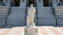 A statue of Italian explorer Christopher Columbus stands outside the Eisenhower Executive Office Building near the White House in Washington, D.C., U.S., March 23, 2026. REUTERS/Kylie Cooper