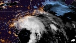This GOES-16 satellite image taken at 9:30 UTC (5:30 a.m. EDT), July 10, 2020 shows Tropical Storm Fay as it moves closer to land in the northeast of the United States. 