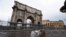 Fragments of the Arch of Constantine lie on the ground after lightning struck it during a storm in Rome, Sept. 3, 2024.