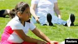 In addition to exercise and healthy food, getting enough sleep also helps children maintain a healthy weight. (Reuters Photo)