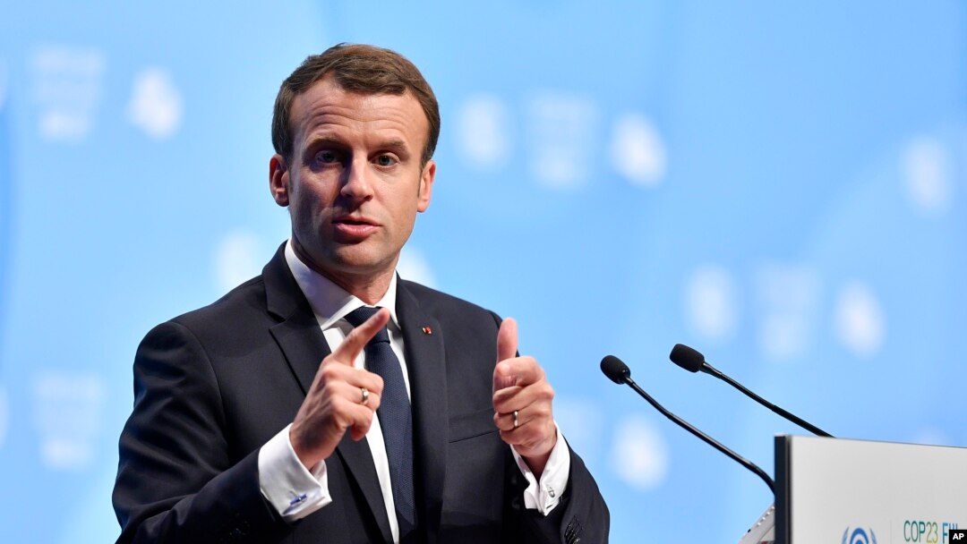 FILE - French President Emmanuel Macron delivers a speech during climate talks in Bonn, Germany, Nov. 15, 2017. 