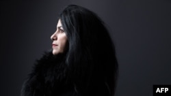 FILE - French-Iranian graphic novelist, cartoonist, illustrator and film director Marjane Satrapi poses during a photo session in Paris on Nov. 1, 2022. Satrapi was awarded the 2024 Princess of Asturias Prize for Communication and Humanity on April 30, 2024.