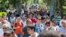 People walk inside Gezi Park at Taksim Square in Istanbul, Turkey, July 8, 2013.