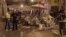 In this still image taken from video, police and rescue services are pictured at the scene after a gas cylinder exploded in a cafe in Velez-Malaga, Spain, Oct. 1, 2016.