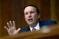 FILE - Democratic Senator Chris Murphy questions a witness during a hearing on Capitol Hill in Washington, July 25, 2018.