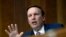 FILE - Democratic Senator Chris Murphy questions questions a witness during a hearing on Capitol Hill in Washington, July 25, 2018. 