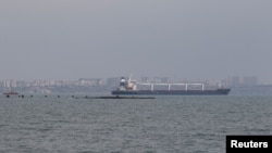 Вантажний корабель Razoni відоходить з порту Одеси, 1 серпня 2022 року. REUTERS/Сергій Смолєнцев