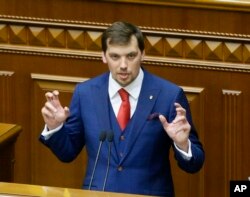 Ukraine's newly elected Prime Minister Oleksiy Honcharuk speaks during a parliament session in Kyiv, Ukraine, Aug. 29, 2019.Honcharuk speaks during parliament session in Kyiv, Ukraine, Aug. 29, 2019.