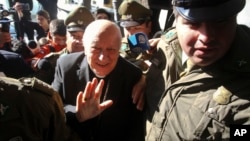 Cardinal Ricardo Ezzati, the archbishop of Santiago, arrives to the prosecutor’s office in Rancagua, Chile, Oct. 3, 2018.