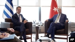 Greek Prime Minister Kyriakos Mitsotakis, left, meets with Turkish President Recep Tayyip Erdoğan on the sidelines of the United Nations General Assembly Sept. 20, 2023. The leaders of Greece and Turkey agreed Wednesday to continue high-level meetings over the next three months. 