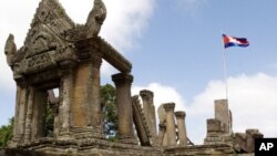 A Cambodian flag flutters near an entrance gate to Cambodia's Preah Vihear temple on the Cambodian-Thai- border in Preah Vihear province.