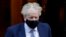 Britain's Prime Minister Boris Johnson leaves Downing Street in London, Jan. 12, 2022.