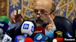 Jordan's Prime Minister Omar al-Razzaz speaks during a news conference in Amman, Jordan June 19, 2018. 