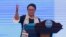 Wearing a Palestinian scarf, Indonesian Foreign Minister Retno Marsudi, gestures as she delivers her opening speech at Bali Democracy Forum held in Tangerang on the outskirts of Jakarta, Dec. 7, 2017. Marsudi condemned the U.S. recognition of Jerusalem as the capital of Israel in her speech at the opening of the forum.