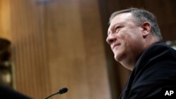 Secretary of state-designate Mike Pompeo listens during the Senate Foreign Relations Committee hearing on his confirmation, April 12, 2018, on Capitol Hill in Washington.
