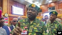 FILE - General Christopher Musa, Nigerian Chief of Defense Staff, speaks to reporters in Abuja, Nigeria, February 20, 2024.