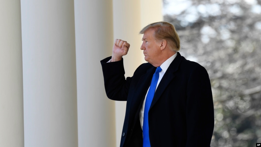President Donald Trump turns back to the audience after speaking during an event in the Rose Garden at the White House in Washington, Feb. 15, 2019, to declare a national emergency in order to build a wall along the southern border. 