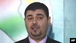 Iraqiya lawmaker Haider al-Mulla speaks to the press in Baghdad, Iraq, 13 Nov 2010