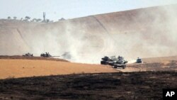 Turkish military move inside Syria near the Turkish border town of Karkamis, Turkey, Aug. 26, 2016. Turkish tanks entered northern Syria on Aug. 24 targeting not only Islamic State fighters but also Kurdish forces.