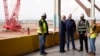 President Joe Biden tours the building site for a new computer chip plant for Taiwan Semiconductor Manufacturing Company, Dec. 6, 2022, in Phoenix, Arizona. 